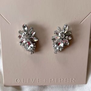 Oliver + Piper statement stud earrings.